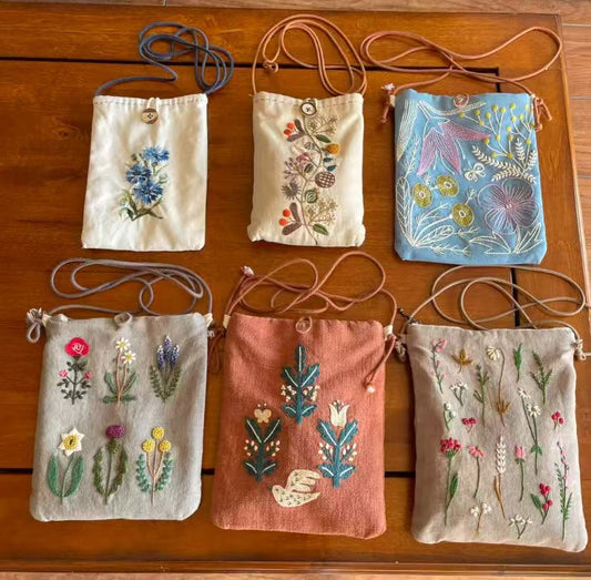 Unique handmade gift items displayed on rustic wooden surface