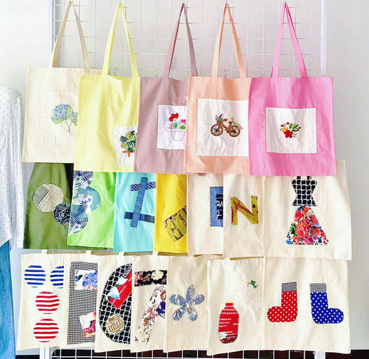 Durable eco-friendly cotton canvas tote bag with hand-printed design
