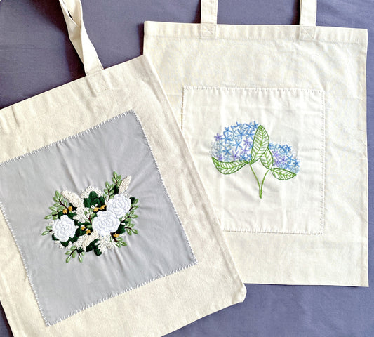 Printed canvas sustainable tote bag carrying groceries and books