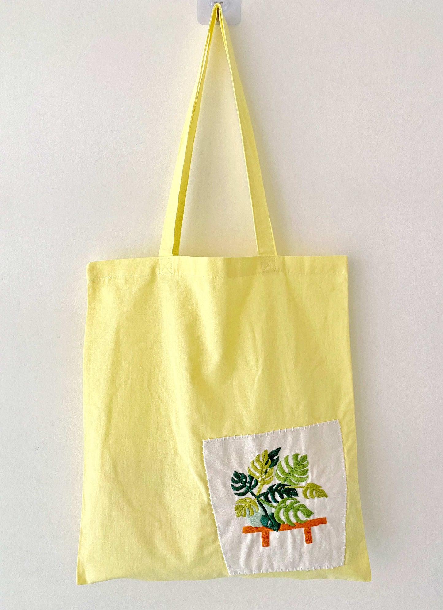 Durable soft cotton shoulder bag with embroidered succulents for nature lovers