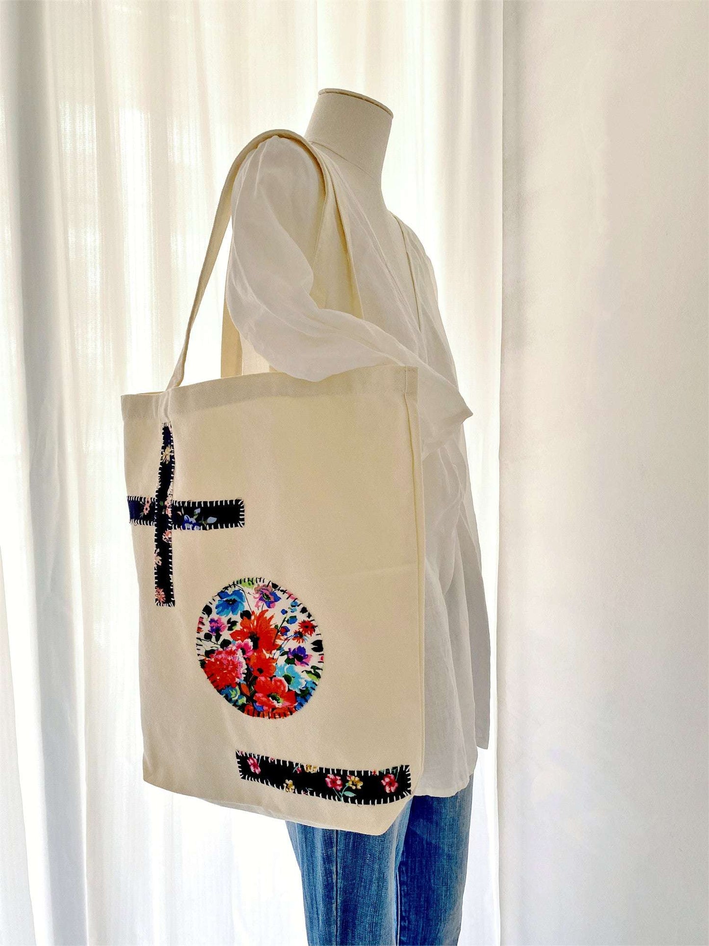 Unique handcrafted tote bag with artistic fabric patterns and minimalist design