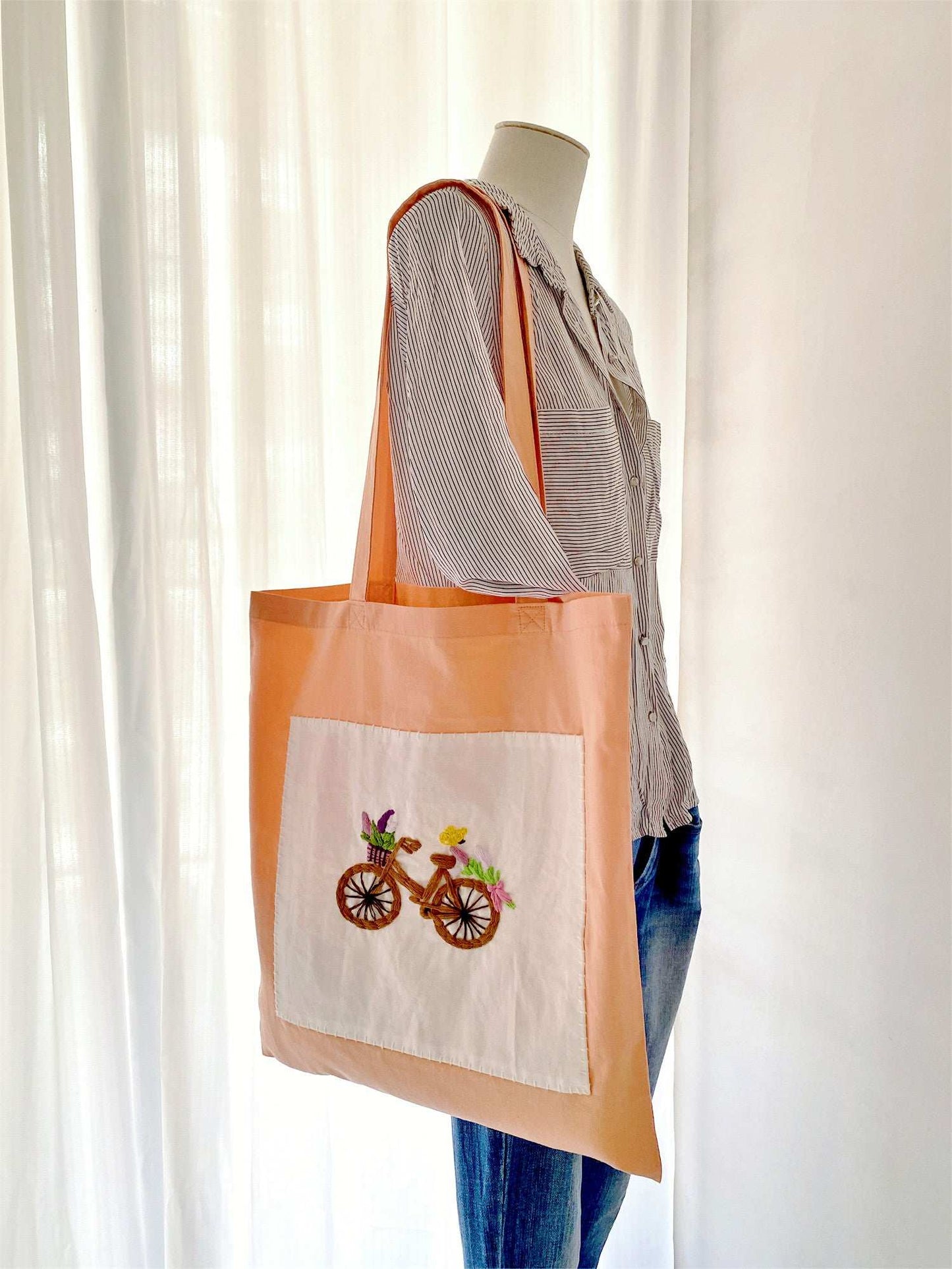 Feminine everyday tote with hand-stitched bicycle and flower details