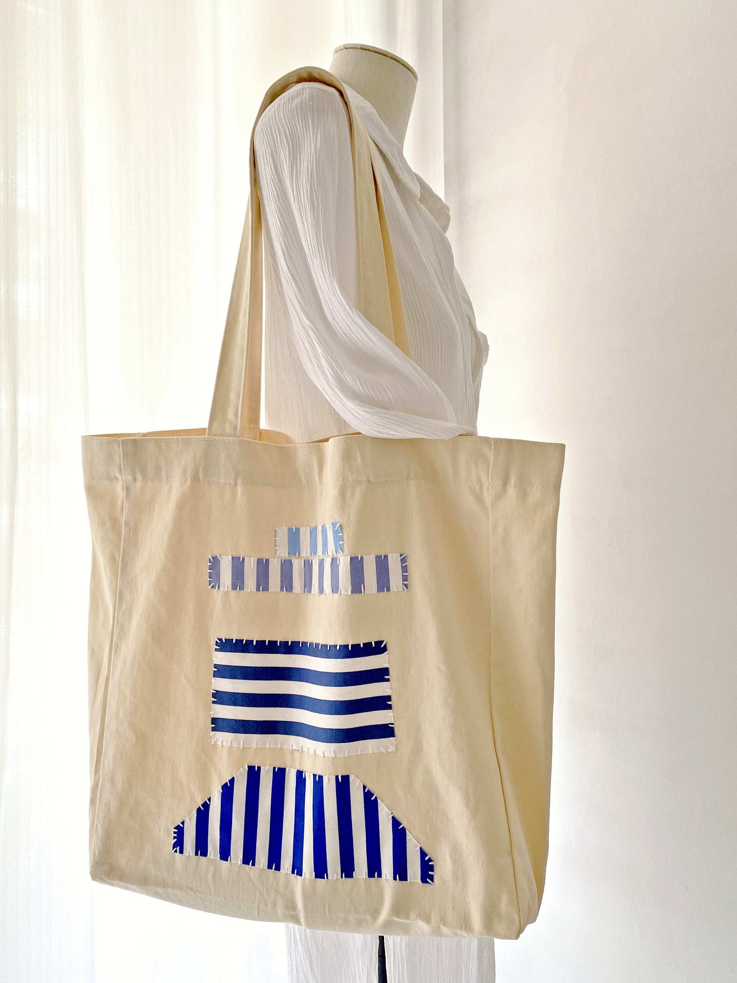 Ethical slow fashion handmade canvas bag for artistic gift seekers