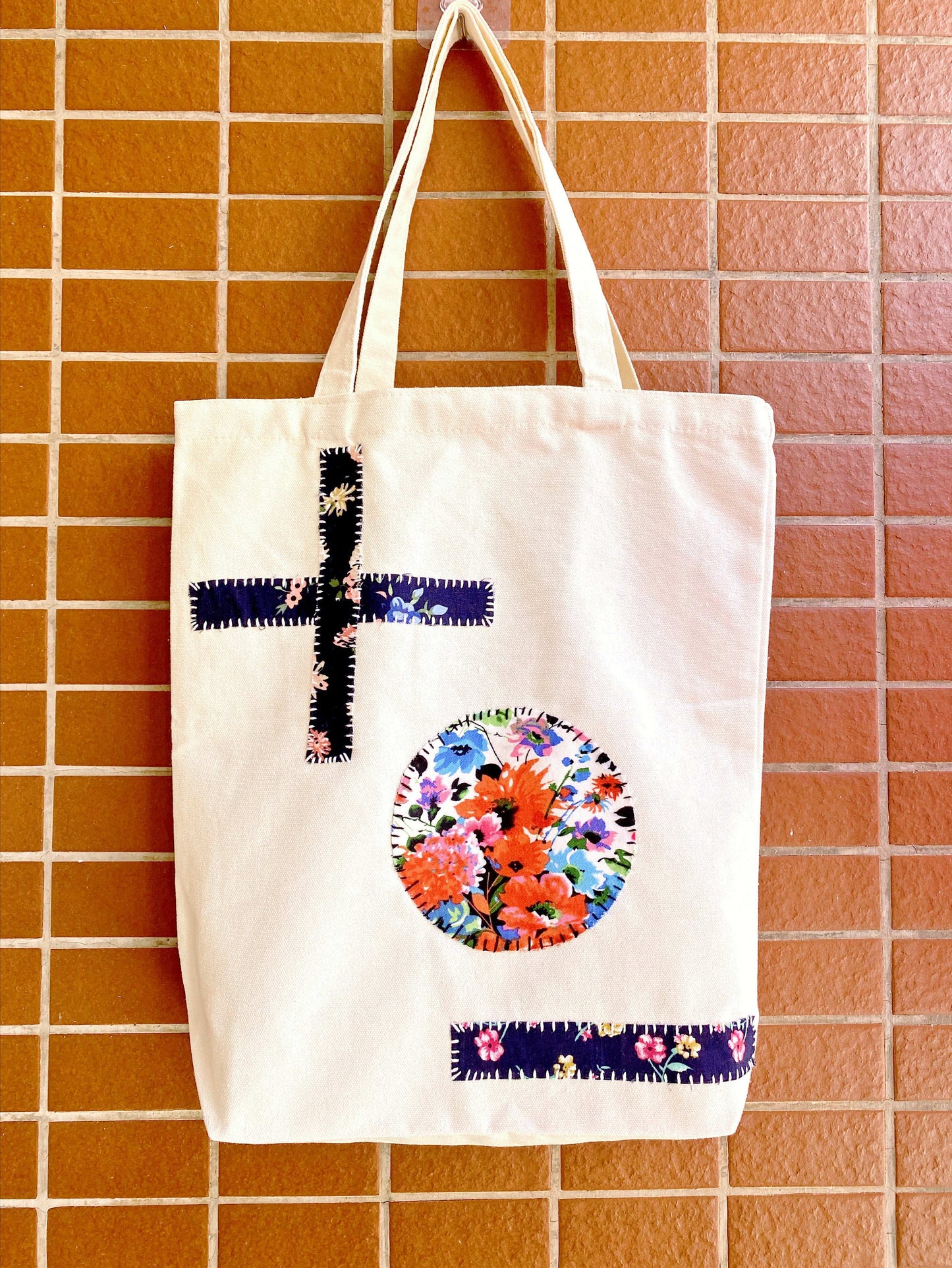 Eco-conscious reusable handmade tote bag with artistic stitching