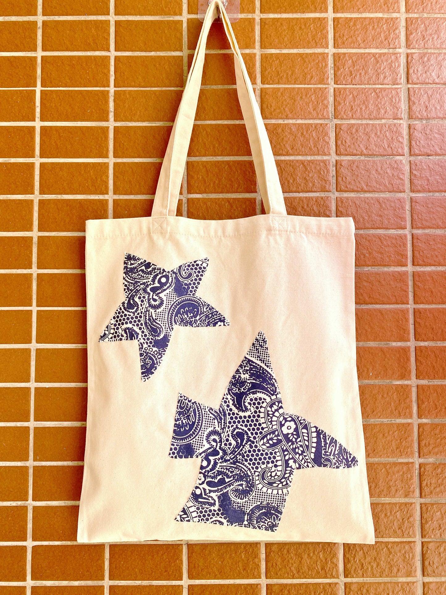 Artistic reusable shopping tote with DIY patchwork design