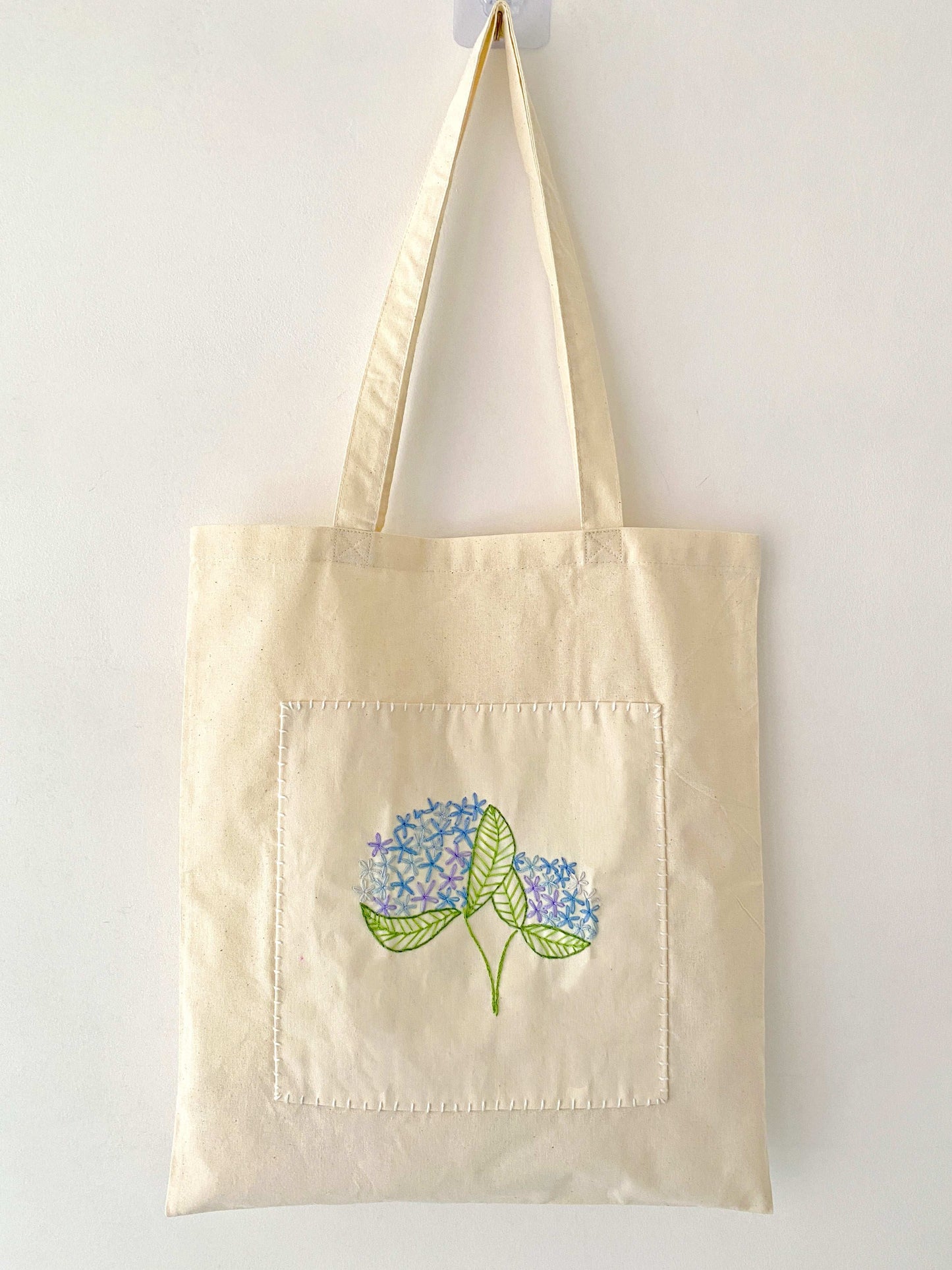 Eco-chic handmade shoulder bag with botanical embroidery for gift ideas