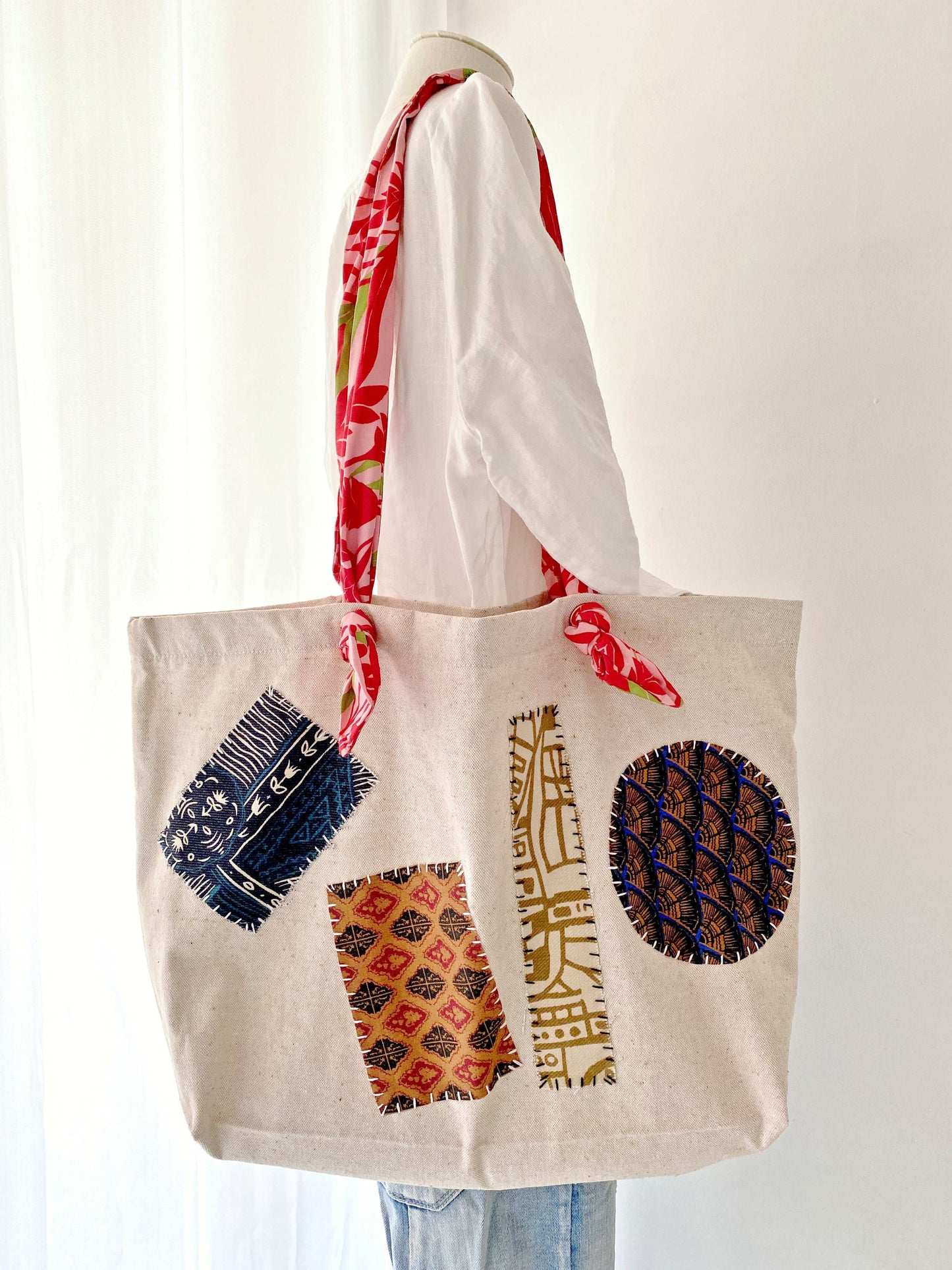 Artisan-made cotton canvas shoulder bag with bohemian patchwork details