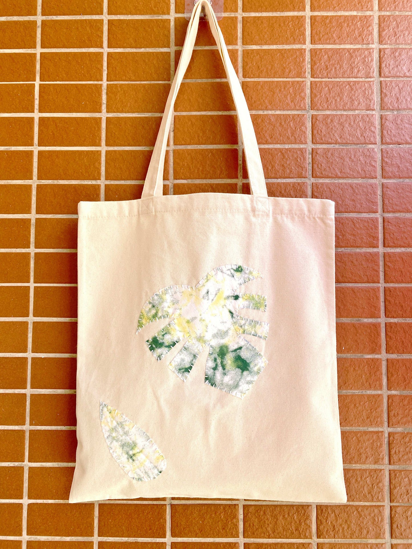One-of-a-kind stitched patchwork tote bag for stylish travelers