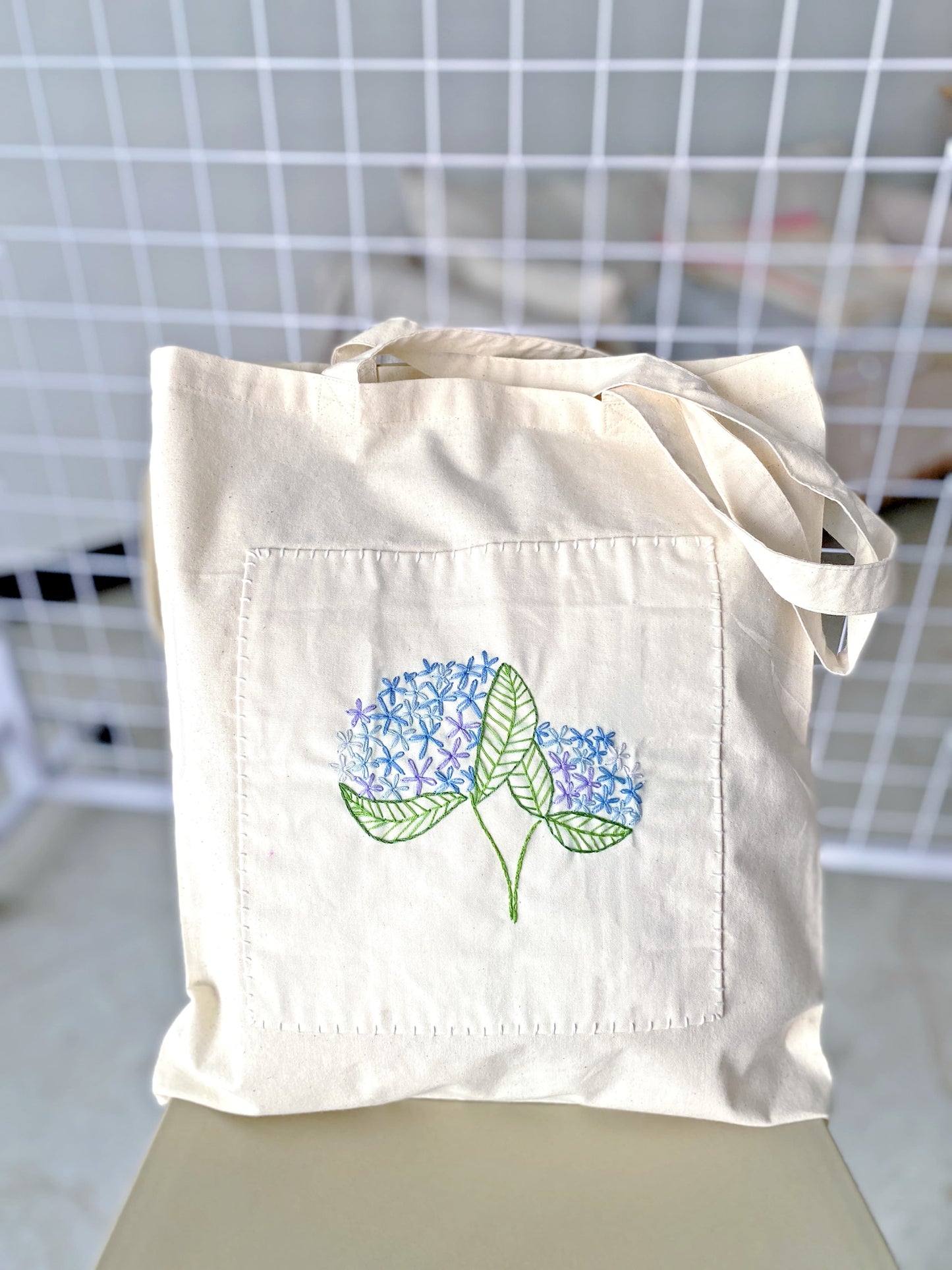 handmade embroidered cotton tote bag perfect for slow fashion