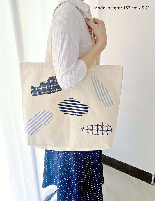 Eco-friendly cotton tote with artisanal patchwork design for women