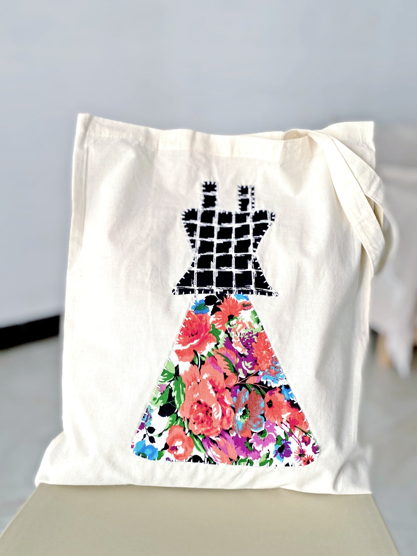Handcrafted patchwork design on soft cotton tote bag, perfect as a thoughtful gift