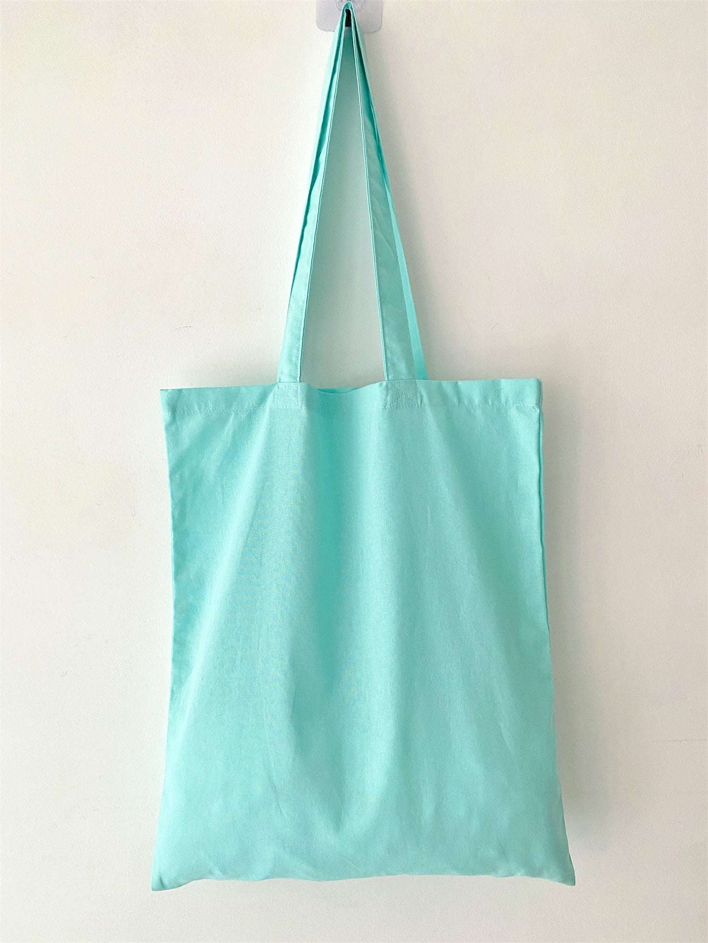cotton tote featuring artistic stitching