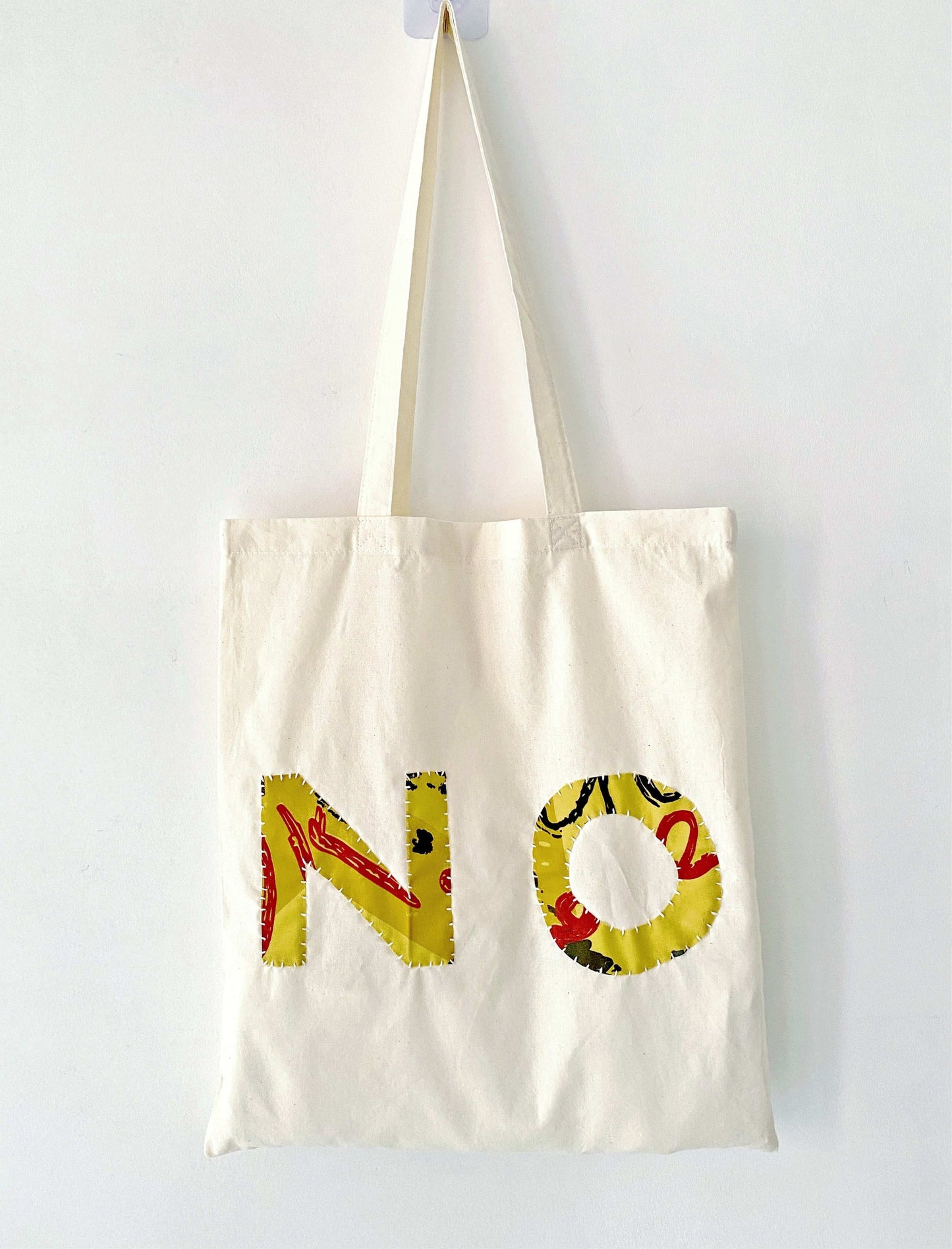 Durable women's bag featuring artistic patchwork, perfect for slow living and unique gifts