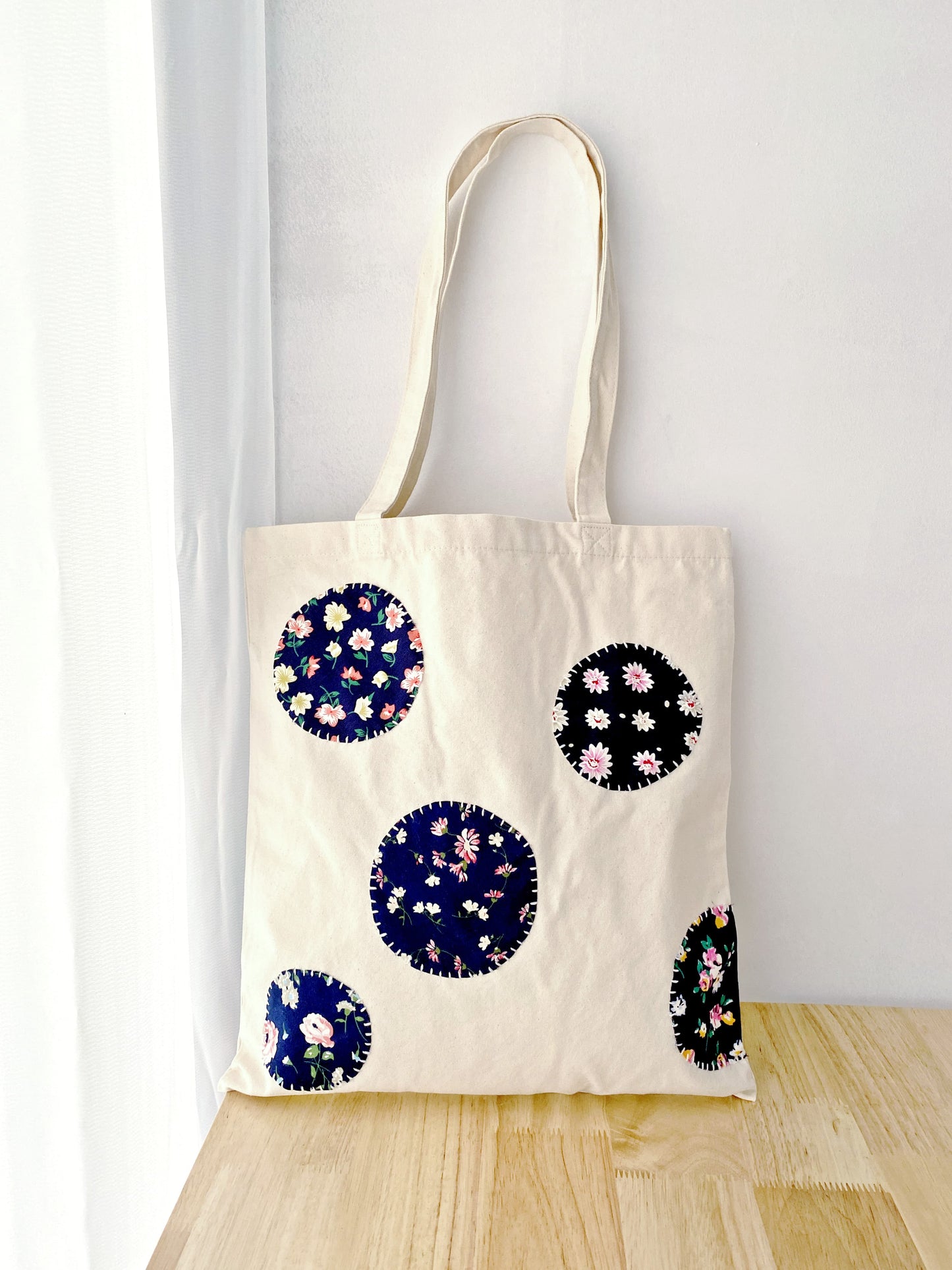 eco-friendly cotton canvas tote bag with hand-stitched patchwork design for women