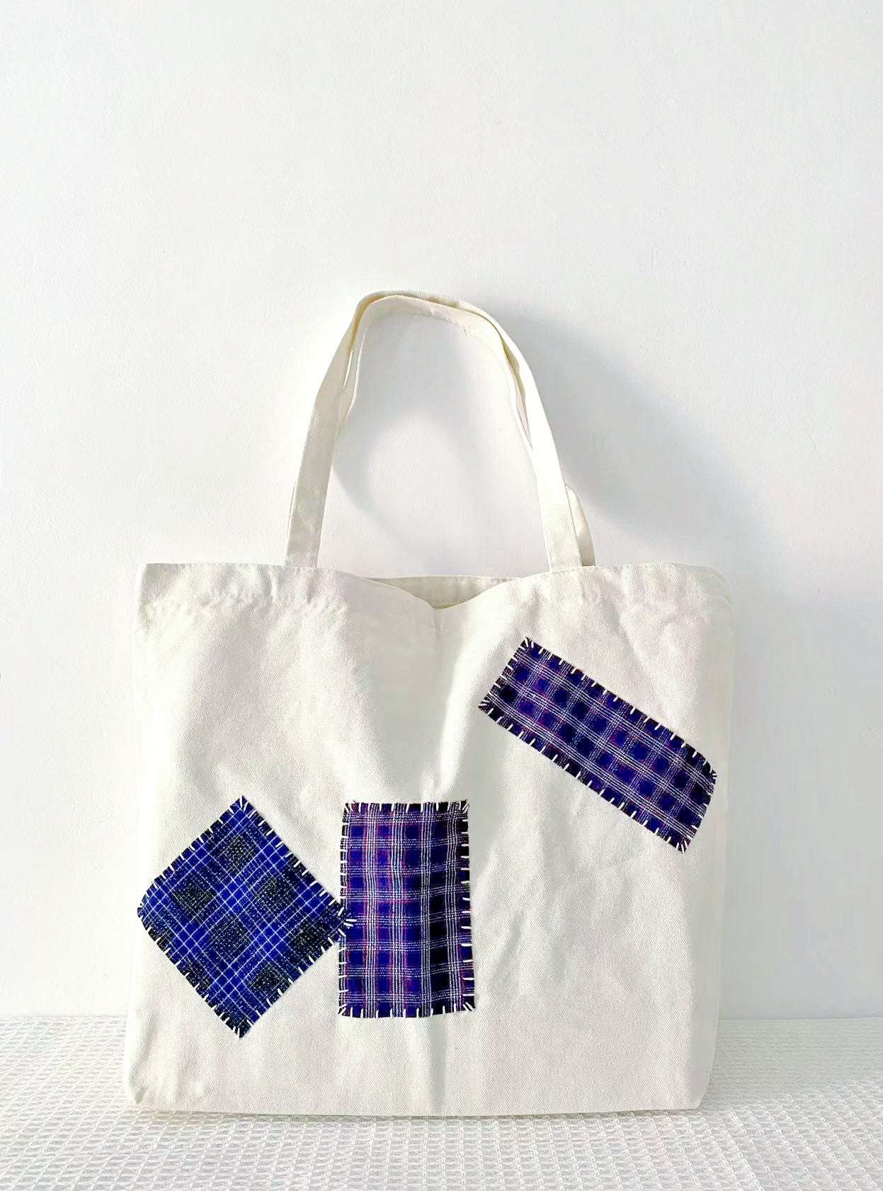natural material tote bag with unique handmade patchwork