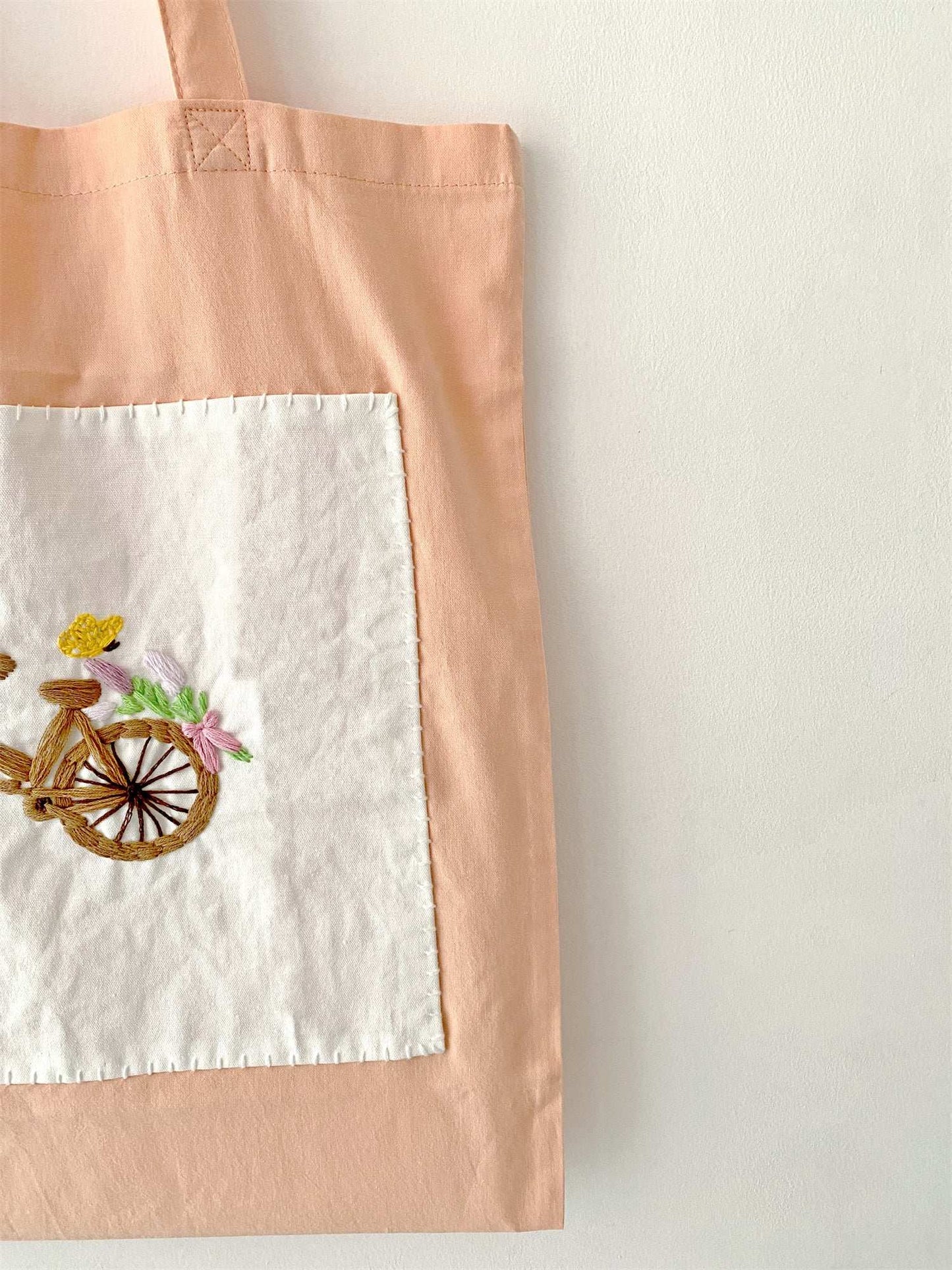 handcrafted cotton tote with nature motif
