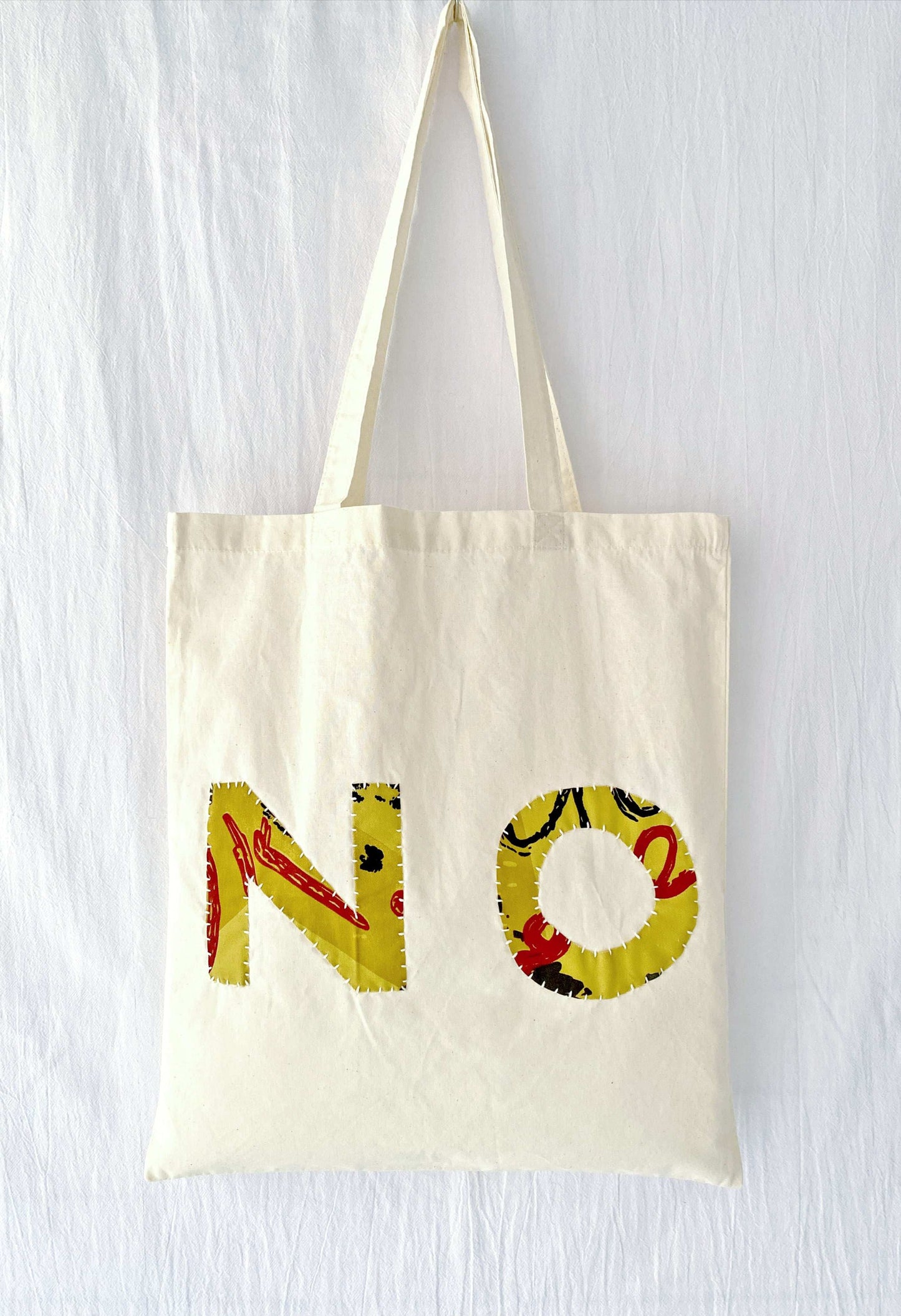 Large-capacity cotton tote with sustainable handmade elements