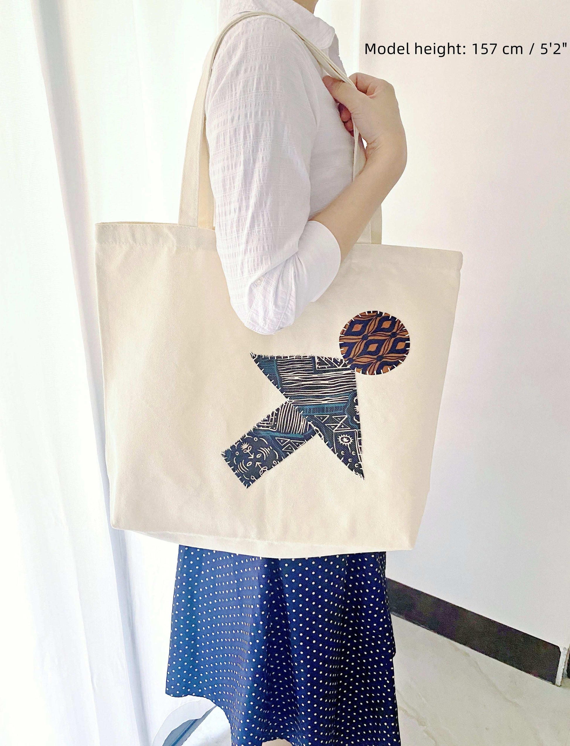 Eco-conscious cotton canvas tote featuring handmade patchwork art