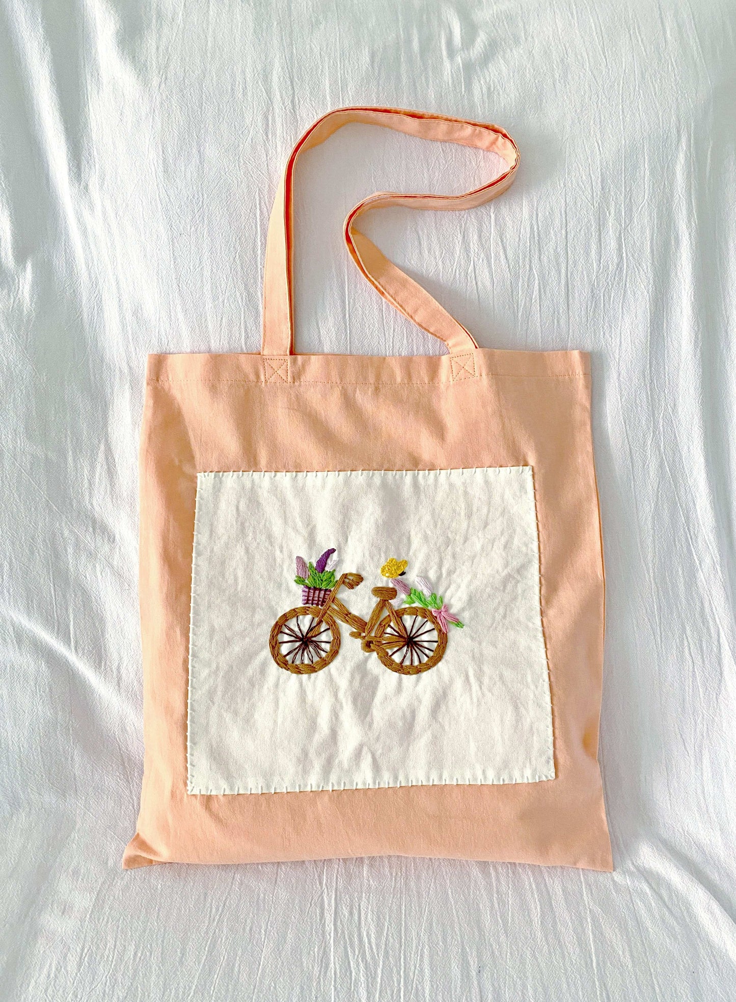 Stylish slow-living tote with soft fabric and artistic embroidery