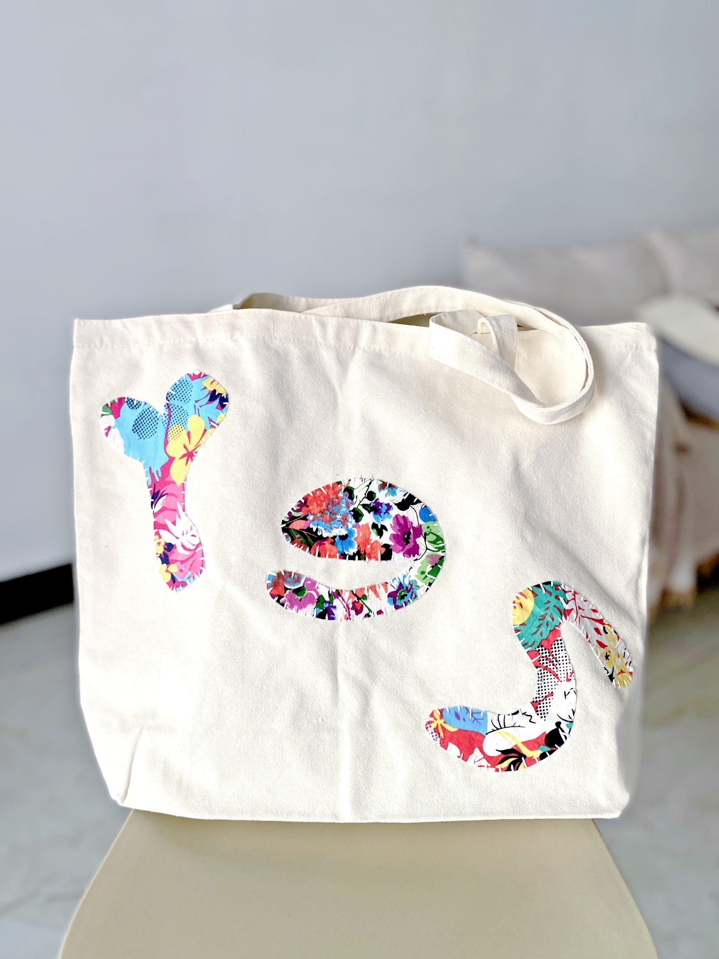 sustainable fabric tote bag for college students with artistic patchwork detail