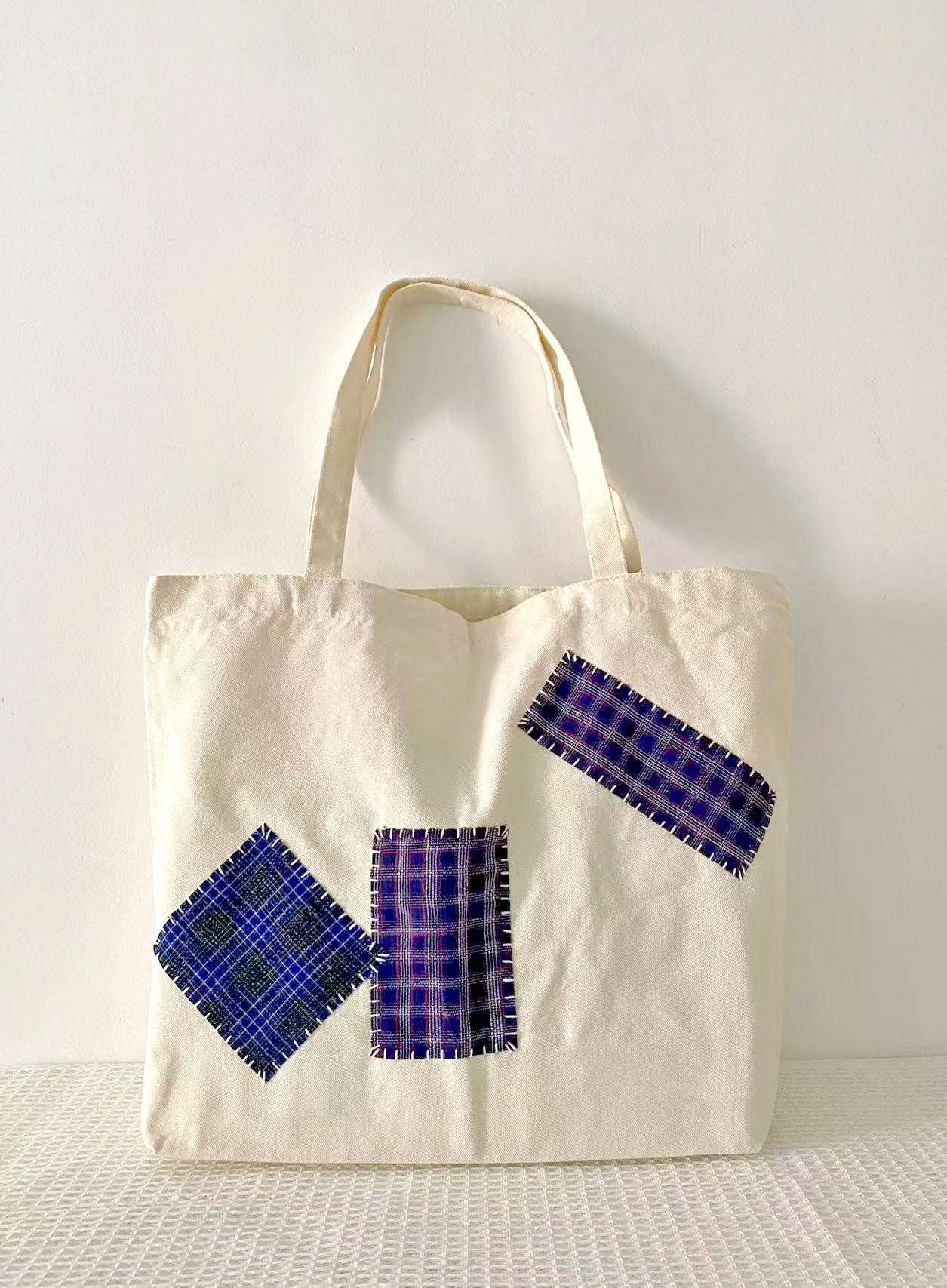 handcrafted patchwork detail on durable tote bag