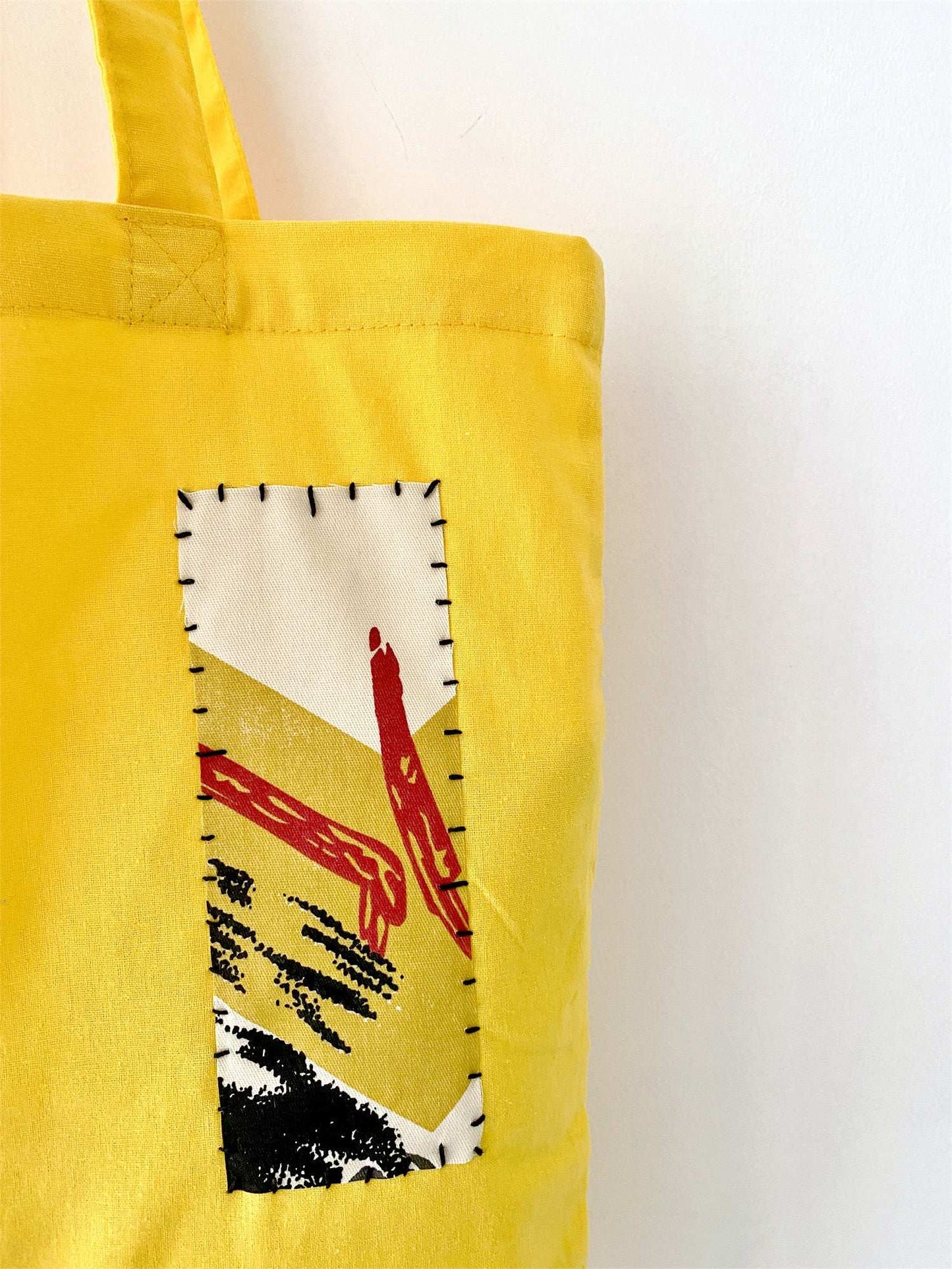 Handcrafted patchwork artwork on casual cotton tote