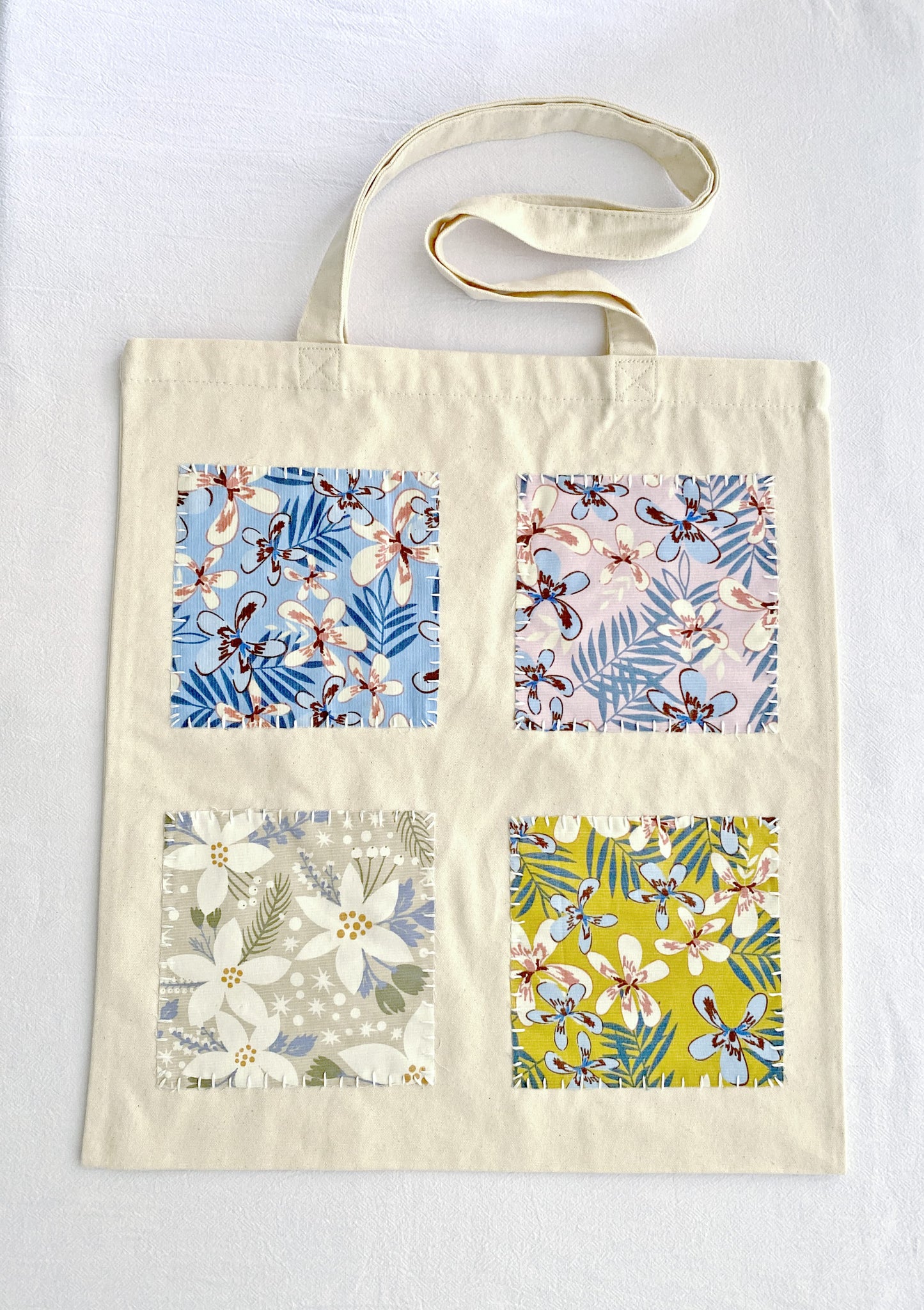 durable eco tote made of natural cotton canvas with handmade patchwork charm