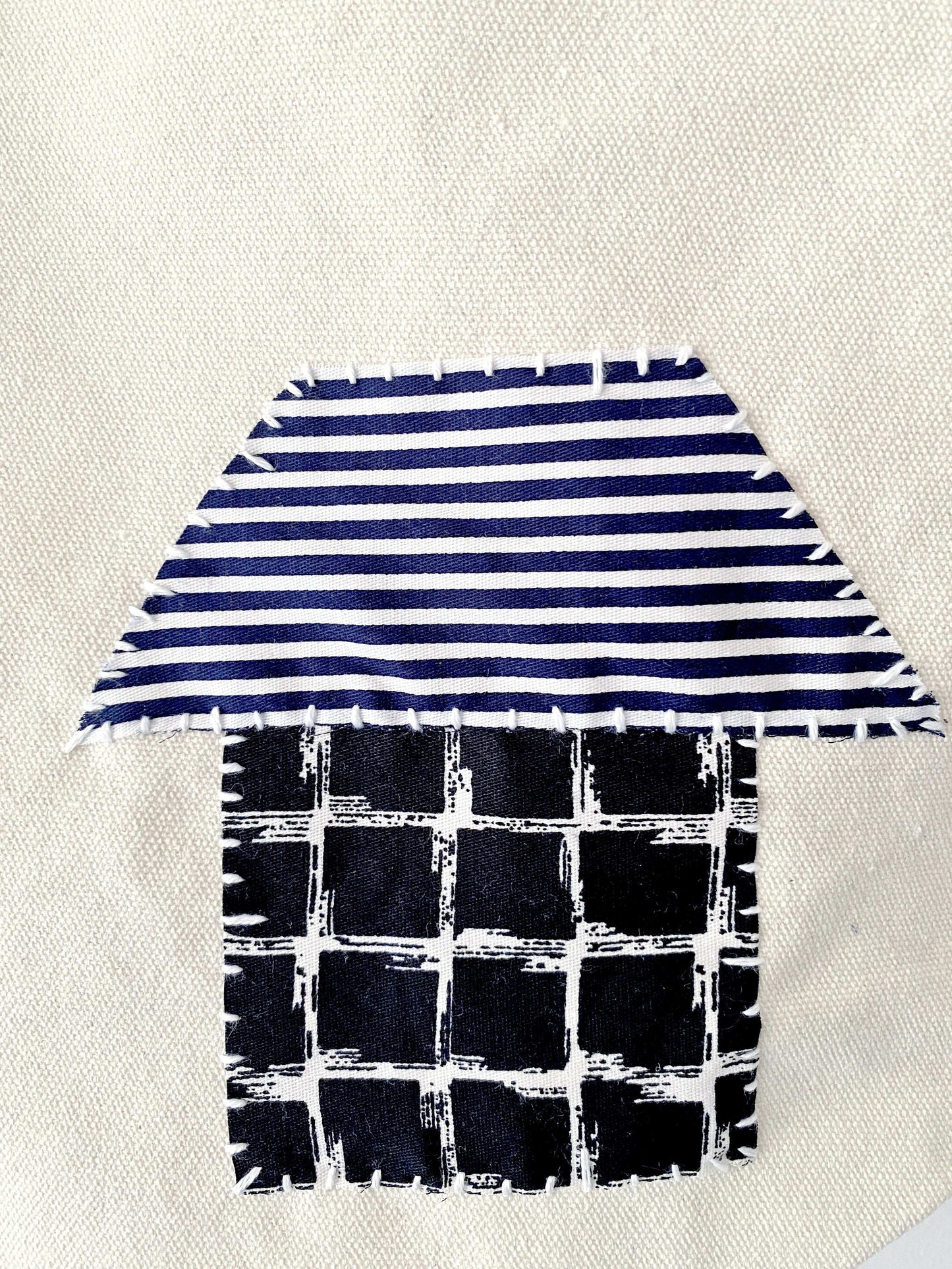 Artisanal eco tote bag made of soft cotton canvas with hand-sewn detail