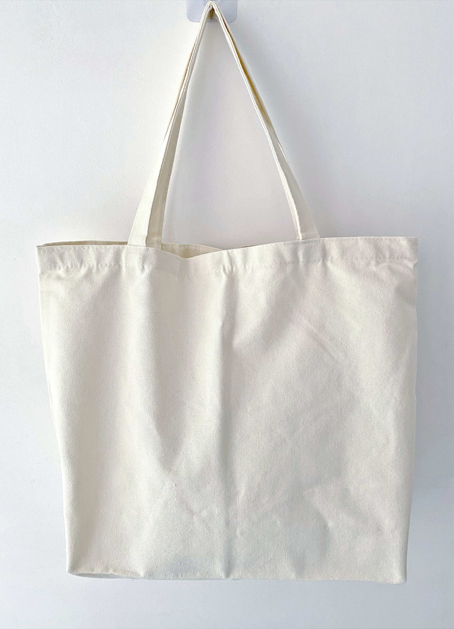 sustainable cotton tote with hand sewn patchwork
