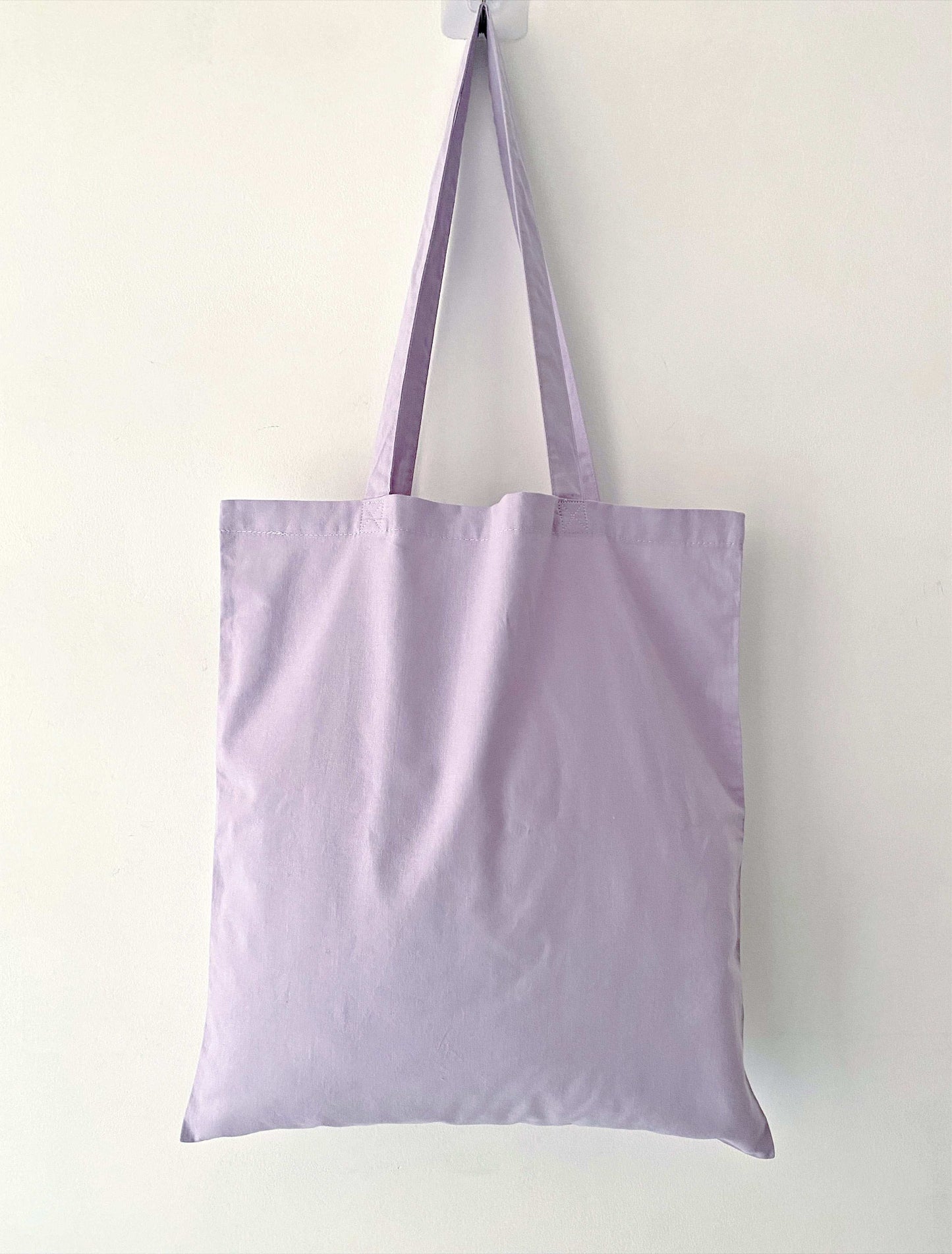 Versatile embroidered tote bag for work, school, or travel