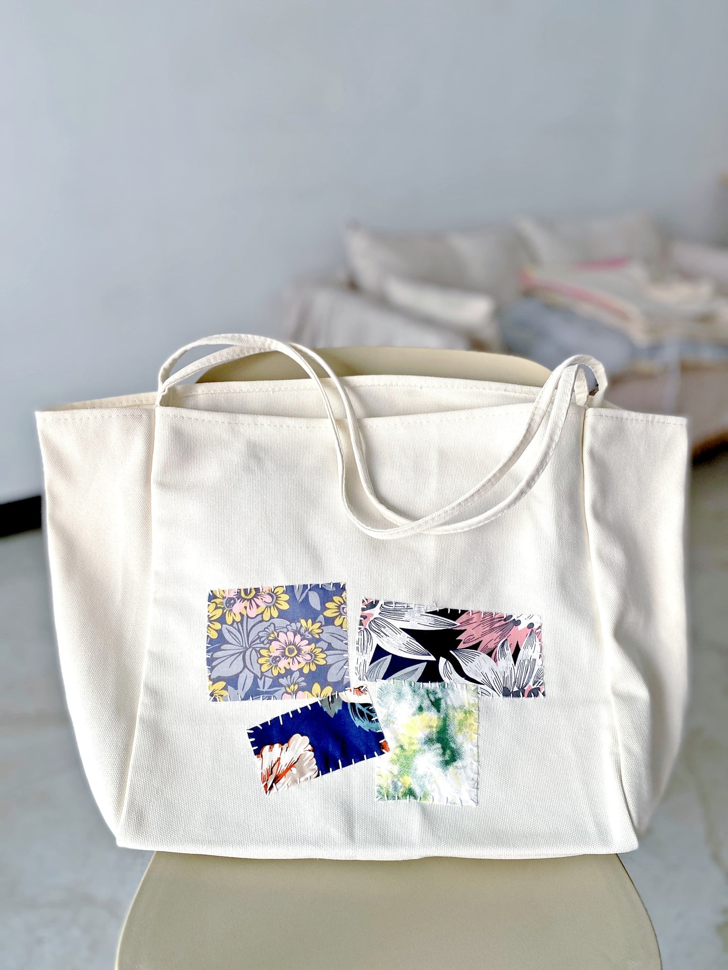 Durable eco-conscious canvas shoulder bag with unique handmade patchwork
