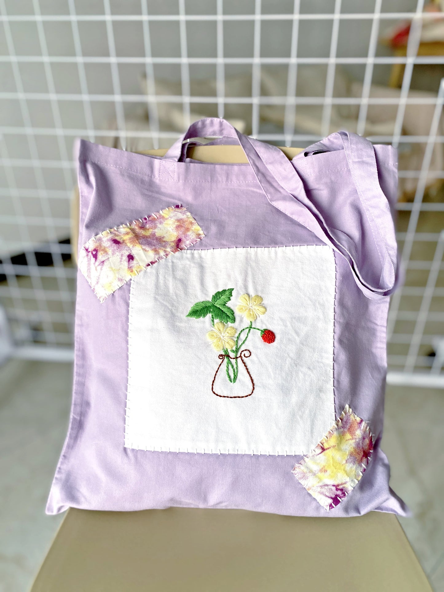 lightweight cotton tote with hand embroidered floral details