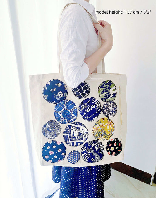Natural canvas shoulder bag designed for thoughtful holiday gifting