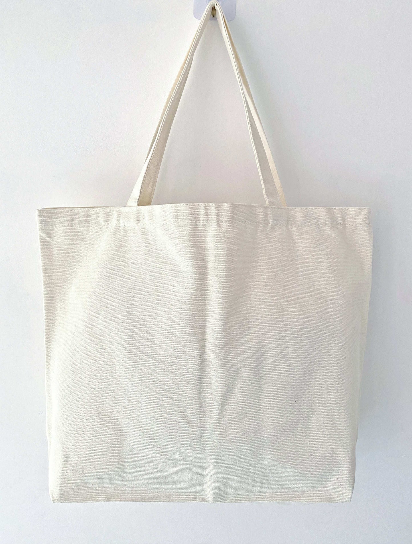 Durable everyday canvas bag with eco-friendly handmade patchwork accents
