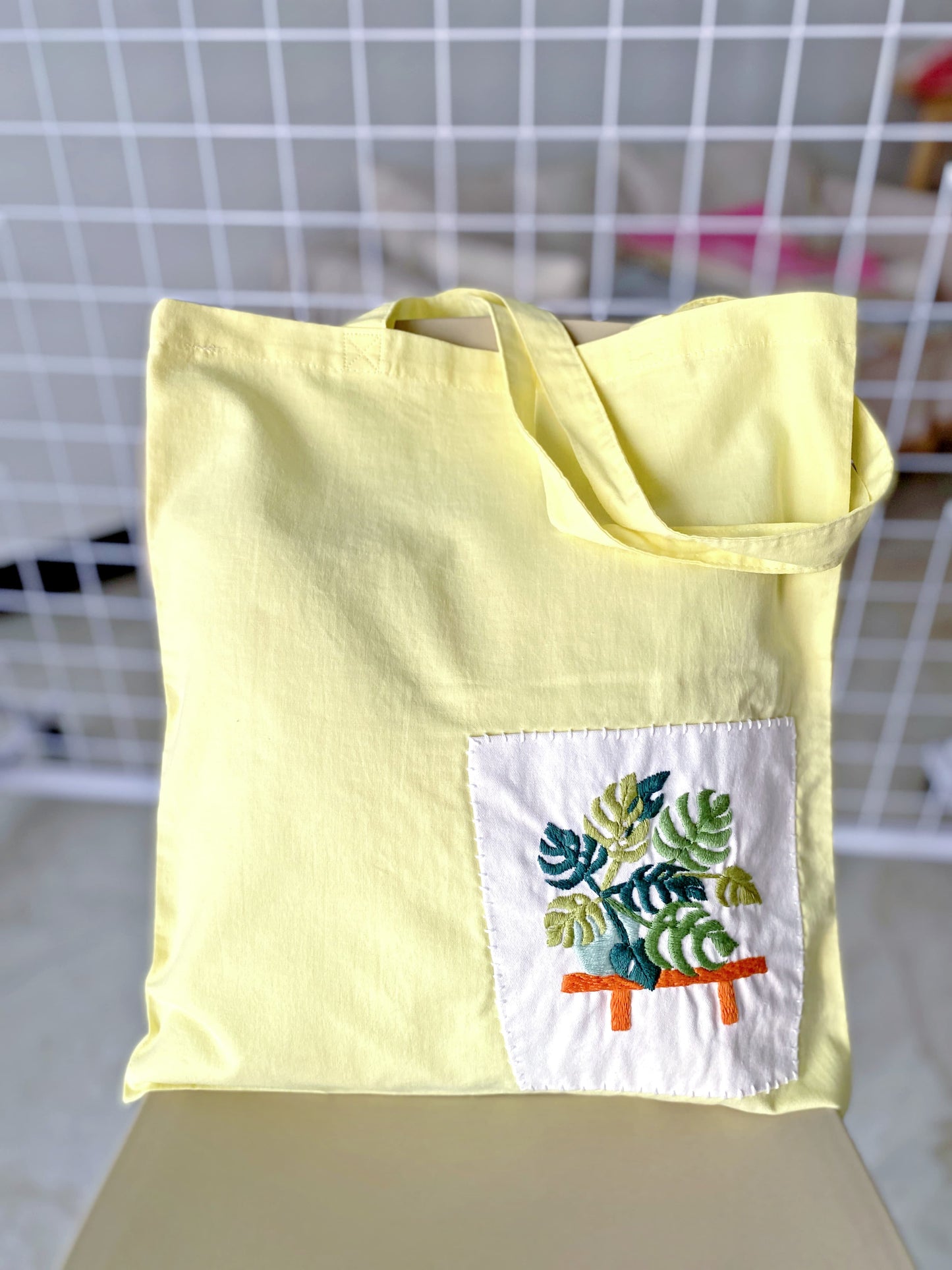 Yellow cotton tote bag with handmade plant embroidery for women