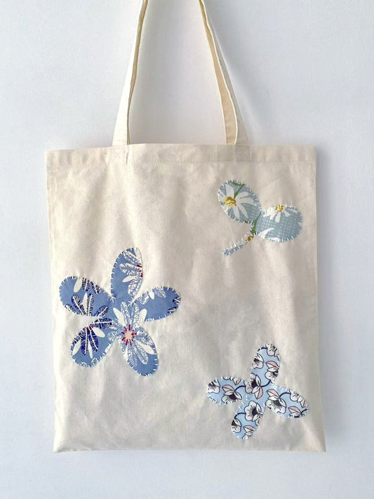 minimalist fabric tote bag used for groceries and daily essentials in natural light