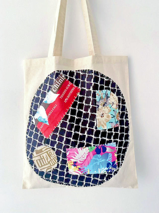 Handmade accessory and naturally dyed cotton tote bag on a casual weekend outfit