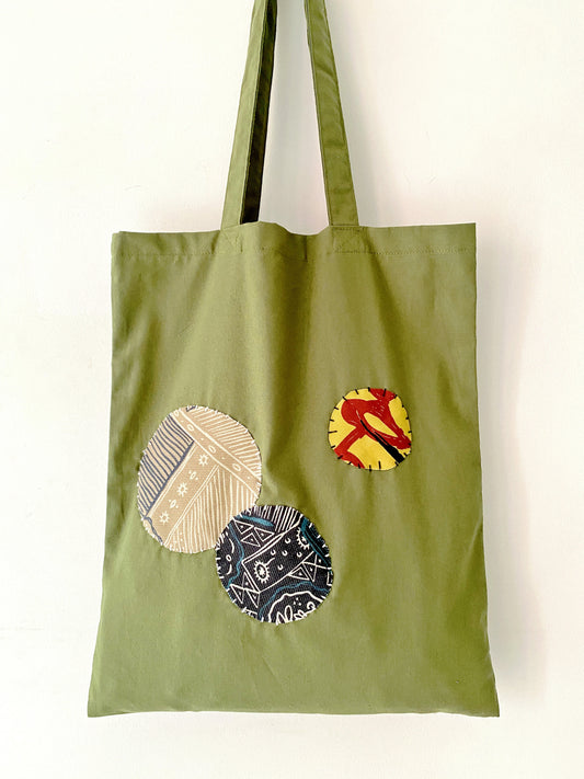Stylish reusable items organized inside a durable canvas tote bag for casual daily use