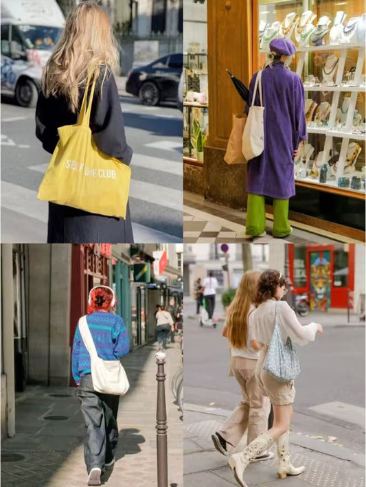 Heavy-duty canvas bag with patchwork and hand-embroidered details for travel and groceries