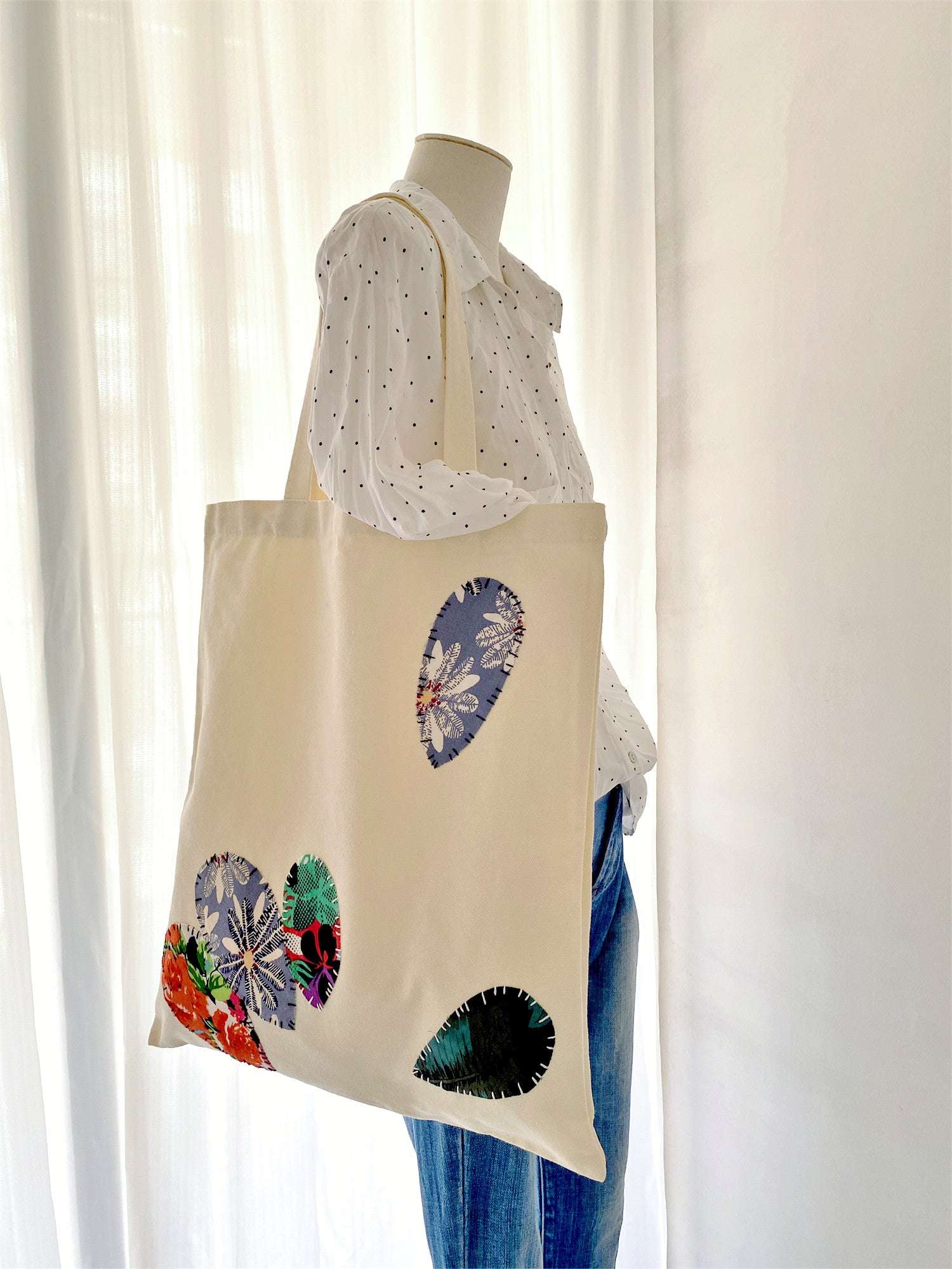 Sustainable handmade shoulder bag with patchwork detail for nature lovers