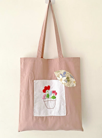 Where to buy durable organic cotton tote with hand-stitched designs