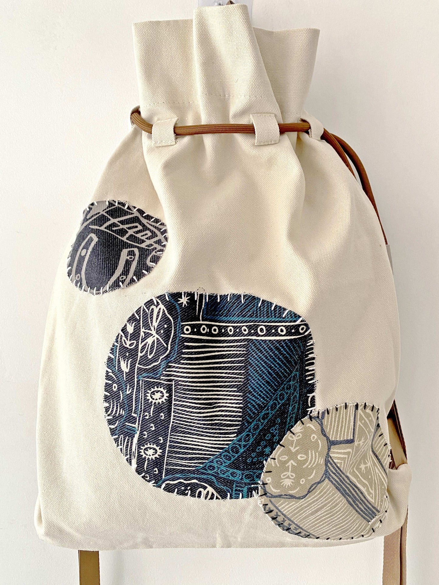 Hand-Sewn Patchwork Backpack for Fashionable Minimalists