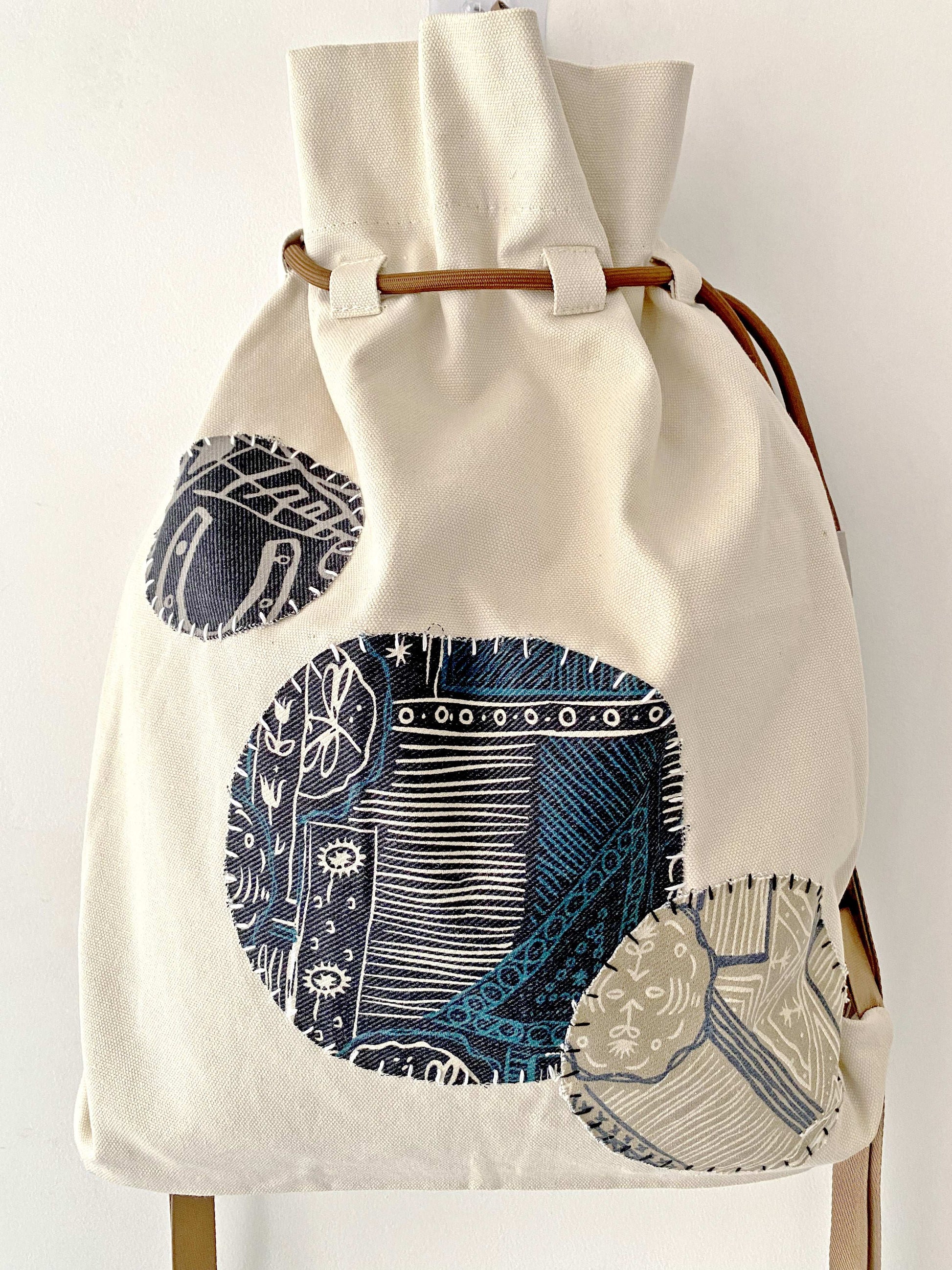 Hand-Sewn Patchwork Backpack for Fashionable Minimalists