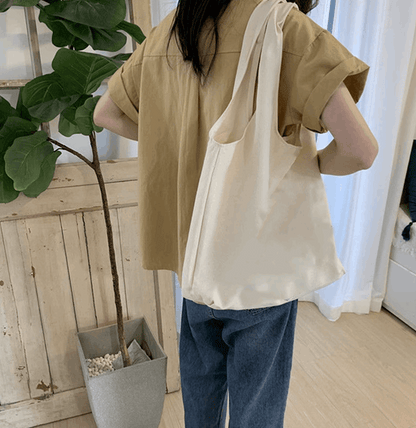 Large Capacity Hand-Sewn Canvas Bag with Custom Patchwork Design for Practical and Stylish Carrying