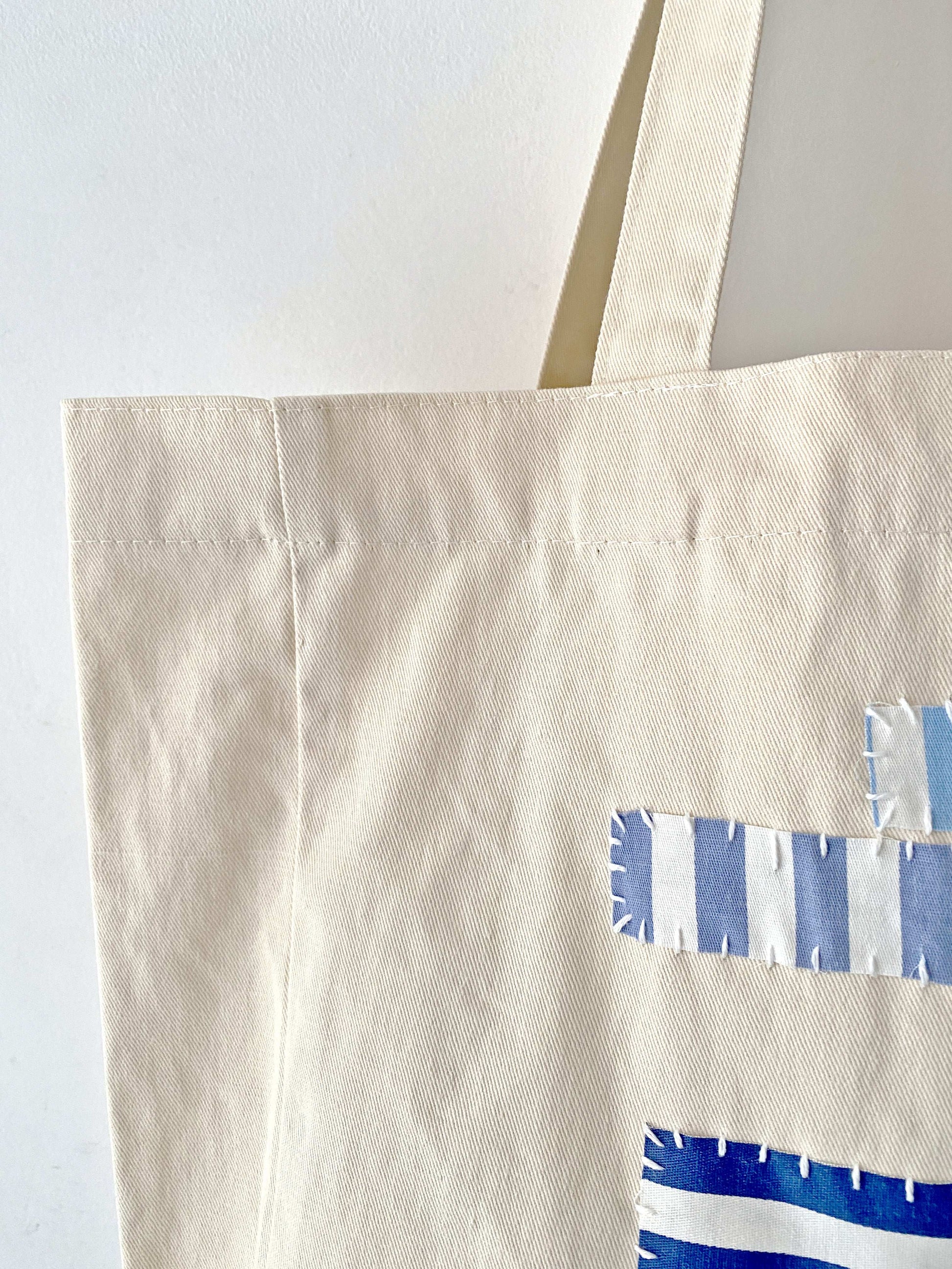Durable and Stylish Large Canvas Shoulder Bag with Hand-Sewn Details