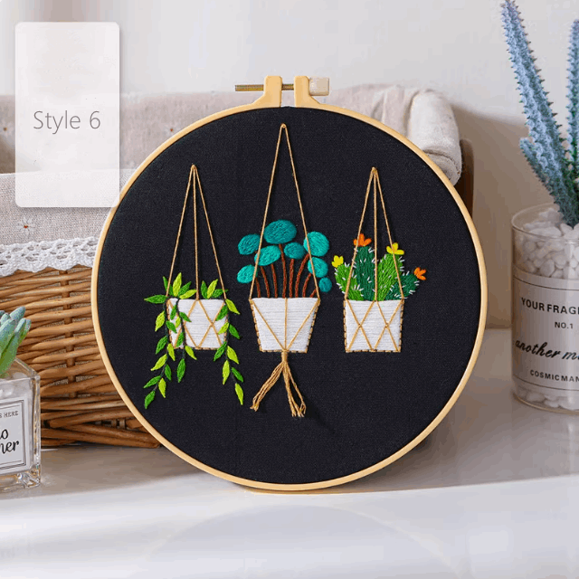 embroidery hoop with green plant and succulent patterns