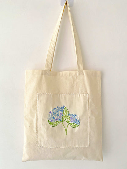 Eco-chic handmade shoulder bag with botanical embroidery for gift ideas