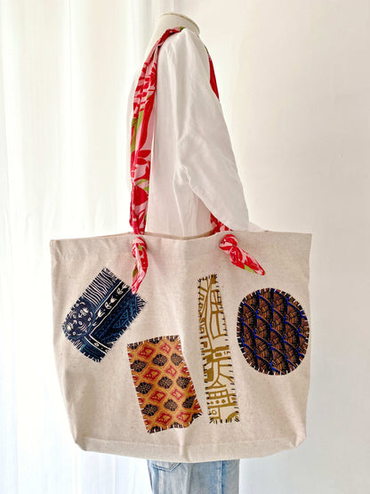 Artisan-made cotton canvas shoulder bag with bohemian patchwork details