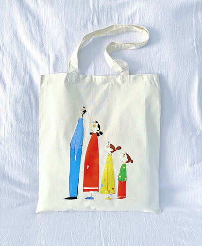 Hand-printed natural cotton tote designed for art-inspired fashion.