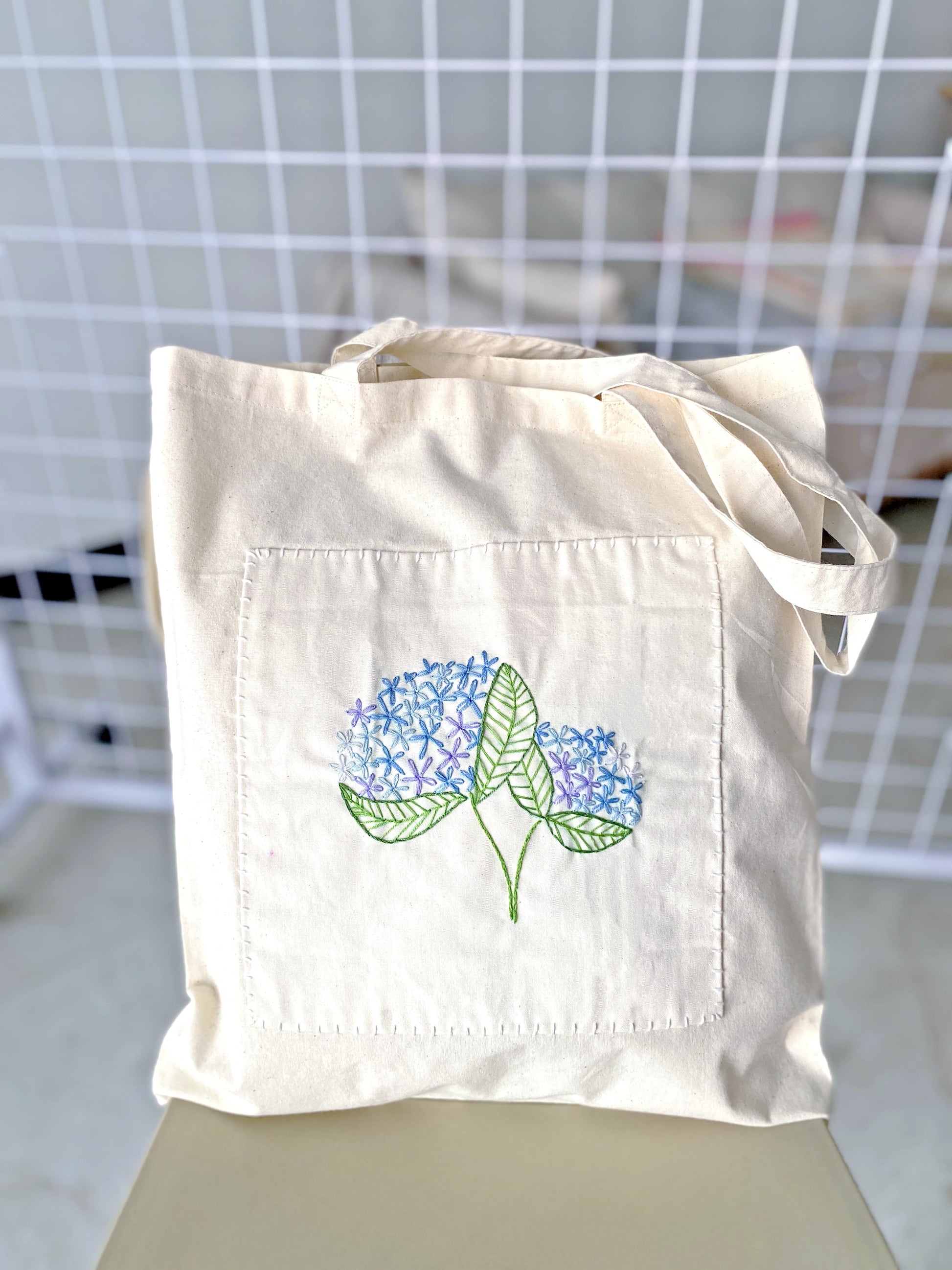 handmade embroidered cotton tote bag perfect for slow fashion